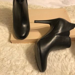 Black heeled booties worn ONCE